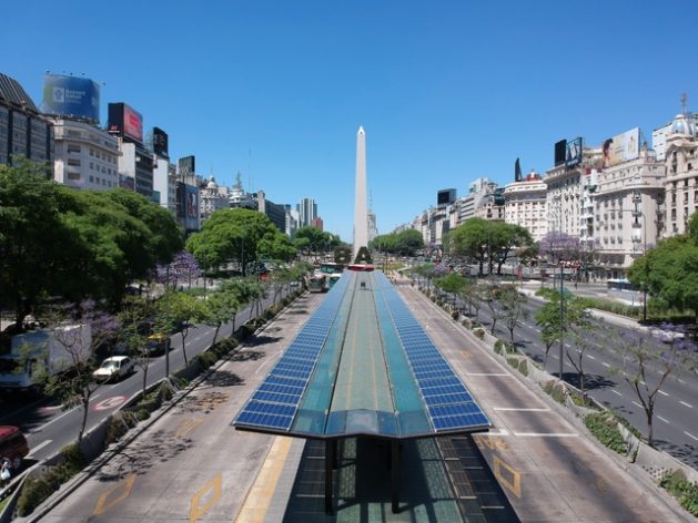Solar panels installed on covered bus stops of the public transport system in the city of Buenos Aires, on the 9 de Julio Avenue, with the emblematic obelisk in the background. Clean and unconventional energies comprise a negligible share of Argentina's energy mix, but different government initiatives seek to change this. Credit: Courtesy of Sustentator