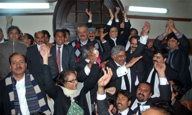 Asma Jahangir and Abid Saqi celebrate the victory of their panel in the Lahore High Court Bar Association election