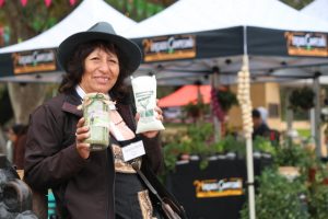 Adelaida Marca, an Aymara indigenous woman, has been successful at the Rural World Expo in Santiago selling her sought-after premium oregano, which has a special fragrance, grown on terraces in Socoroma, her village in the highlands of northern Chile. Credit: Indap