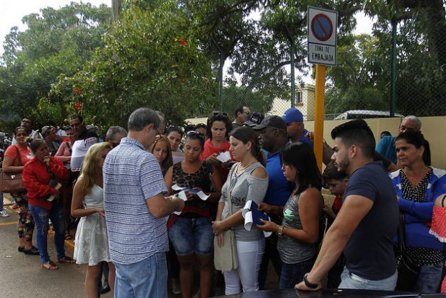 Cubans wait in line outside the Colombian embassy in Havana, to obtain a visa for Colombia in order to apply for a U.S. visa at the U.S. embassy in Bogotá, due to the reductions in staff in the U.S. embassy in the Cuban capital. Credit: Jorge Luis Baños / IPS