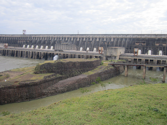 View of Itaipu, the largest hydroelectric power station in the Americas, shared by Brazil and Paraguay on their Paraná river border, an example of a megaproject promoted by the Brazilian military dictatorship in the 1970s and 1980s. In operation since 1984, it has a 1,350-sq-km reservoir and a capacity of 14,000 megawatts, only surpassed by the Chinese Three Gorges, which has a capacity of 22,400 megawatts. Credit: Mario Osava / IPS
