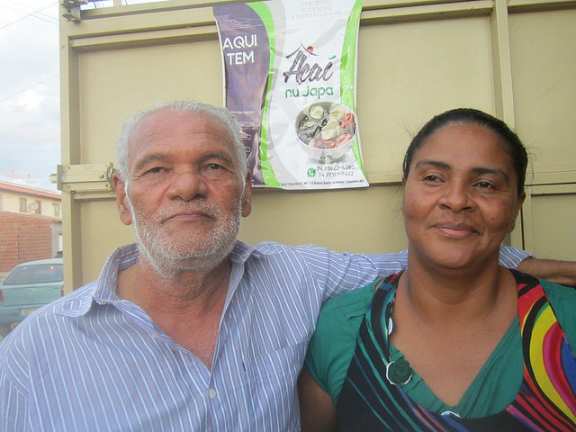 David Lima and his wife Aedna Caravalho pose for pictures in front of the ice cream stand they set up in front of their house in one of the housing complexes on the outskirts of Juazeiro, in northeastern Brazil. As a social and political activist, Lima is working to reactivate the solar project. Credit: Mario Osava/IPS