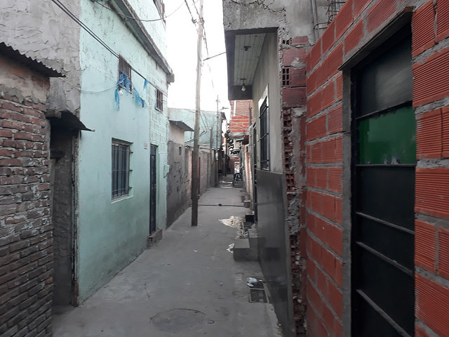In this alleyway in Villa 21, a slum in the capital of Argentina, is located the house where nine-year-old Kevin Molina was hit and killed by a stray bullet in a shootout between drug gangs in 2013, and the police refused to intervene, according to reports. Credit: Daniel Gutman/IPS