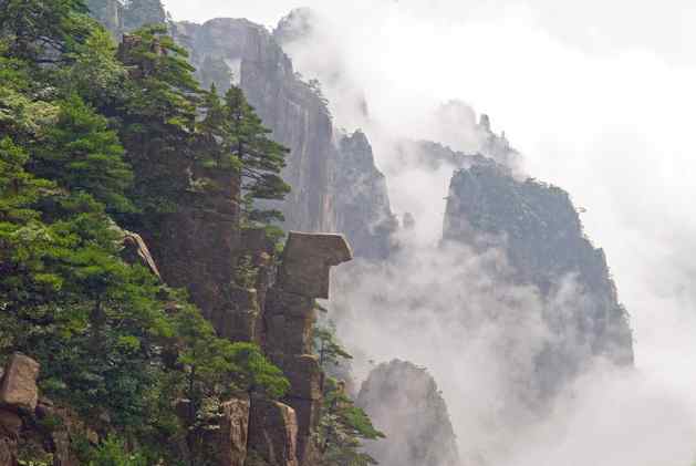 Huangshan or the Yellow Mountain in China’s Anhui Province. The natural beauty of rock formations, lush green pine trees and a sea of cloud has inspired countless painters and poets over the ages. Credit: Trevor Page