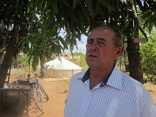 São Gonçalo, a district in the municipality of Sousa, in Brazil's semiarid eco-region, has become a village of retirees due to the exodus of young people as a result of the collapse of irrigation agriculture, according to Francisco Honorato Filho, president of the Sousa Rural Workers Union. In the background is a tank that stores rainwater for drinking and cooking, one of one million such tanks in the region, which have eased the water shortage. Credit: Mario Osava/IPS
