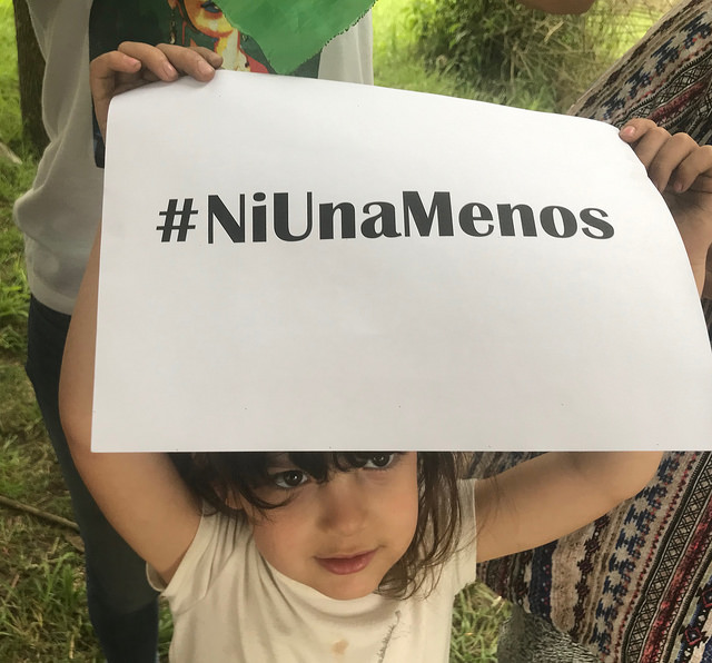 Five-year-old Olivia holds up a sign with the slogan against femicide, #NiUnaMenos (Not One Woman Less), which has spread throughout Latin America in mass mobilisations against gender violence. Olivia participated in a neighborhood activity in the Argentine city of La Plata on the International Day for the Elimination of Violence against Women, celebrated Nov. 25. Credit: Fabiana Frayssinet/IPS