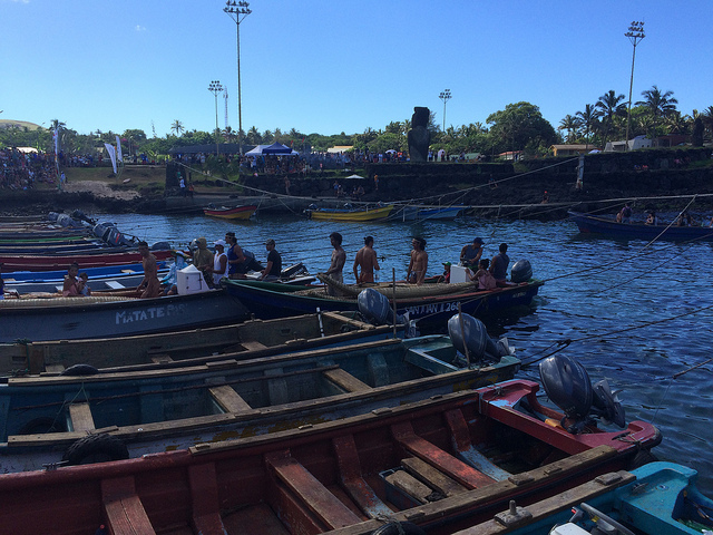 The wharf in Hotu Matua square is the meeting point for Rapa Nui indigenous people in Hanga Roa, the capital and only town on Easter Island or Rapa Nui. In February, the triathlon competition of the annual Tapati festival is held there, which includes swimming on totora reed rafts and running with bunches of bananas around the neck, and is one of the traditional activities being revived in Chile’s Polynesian island. Credit: Orlando Milesi/IPS