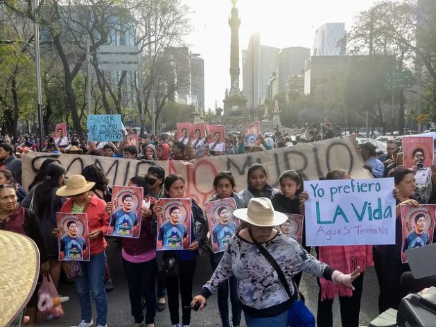 Demonstrators demand clarification of the murder of land rights activist Samir Flores and the shutdown of a thermoelectric plant in the state of Morelos, in central Mexico, in a February 2019 protest on Mexico City's emblematic Paseo Reforma. CREDIT: Emilio Godoy/IPS