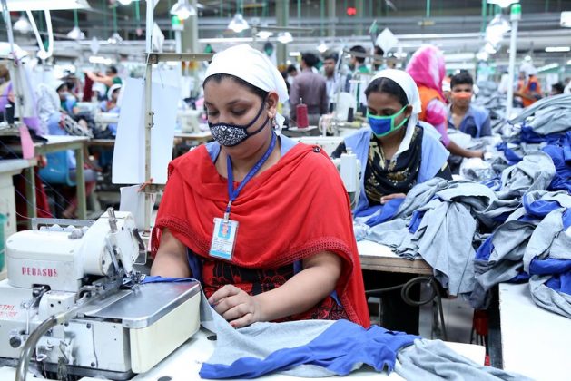 Fast fashion consumes vast resources, often polluting and devastating the natural world. Pictured here are garment workers in Bangladesh. Credit: Obaidul Arif/IPS