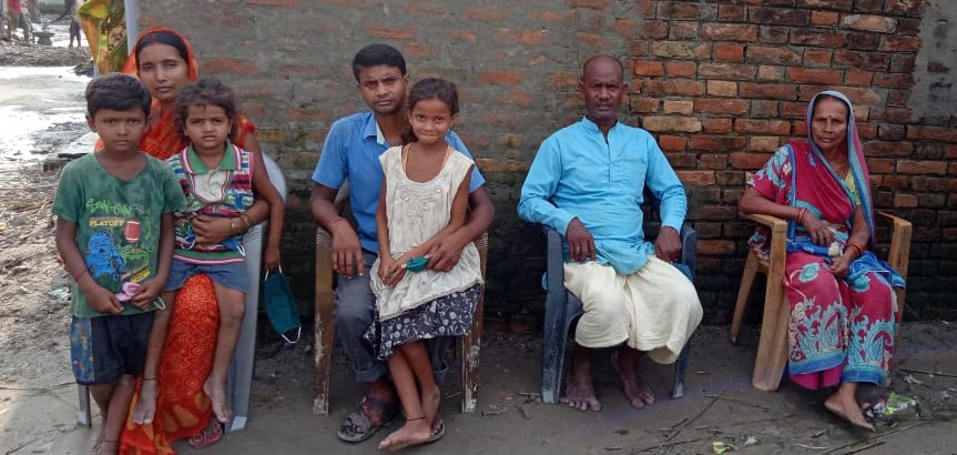 Veena Devi (left) with her in-laws and husband. She was able to save her husband's family from years of bonded labour.