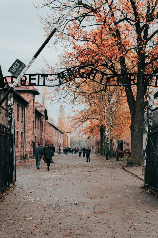 The gates of World War II concentration camp, Auschwitz. Approximately 1.1 million people — including 900,000 Jews — were killed in the biggest extermination camp from World War II. Photo by Jean Carlo Emer on Unsplash