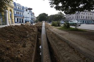 High-density polyethylene pipe is laid on a street in the Cuban capital, where the Aguas de La Habana water company is upgrading the water supply networks in the municipality of Centro Habana. CREDIT: Jorge Luis Baños/IPS