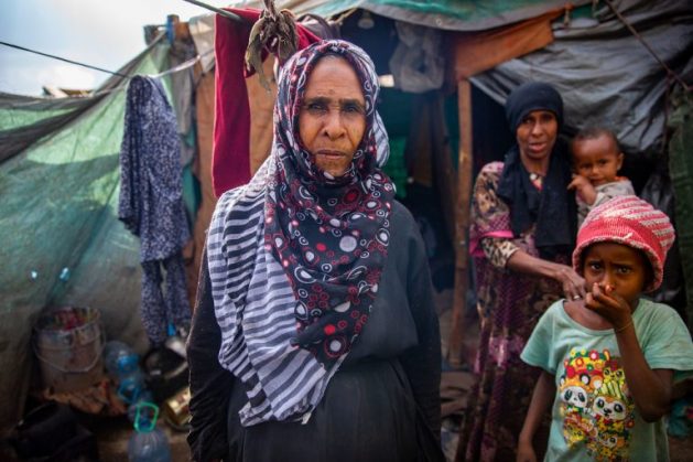 A displaced Yemeni woman stands outside a makeshift shelter that she shares with her extended family. U.S. Ambassador Linda Thomas-Greenfield said while the Biden administration is ‘stepping up its diplomacy’ to end the war, peace is impossible if the Houthis continue their relentless attacks against the Yemeni people and Yemen’s neighbours. (file photo) Courtesy: IOM/O. Headon