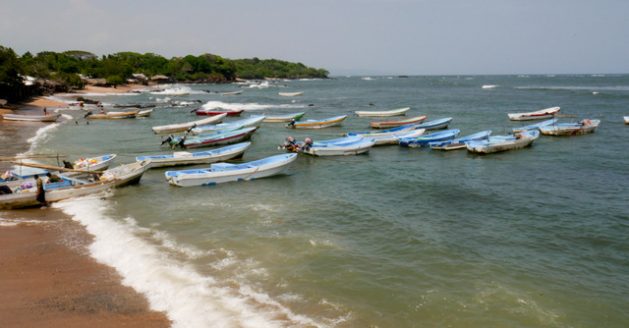 Punta Remedios is a beach of singular beauty that also provides shelter for the boats of the fishing community of Los Cóbanos, on the Pacific coast of El Salvador. It is home to the only rocky reef with coral growth in the country, which is being damaged by climate phenomena and human activities. CREDIT: Edgardo Ayala/IPS