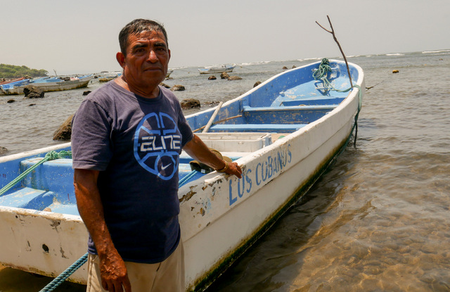 Fisherman Luis Morán, a resident of Punta Remedios beach in the hamlet of Los Cóbanos in western El Salvador, says human activities such as overfishing and unsustainable tourism are damaging the health of the coral reef located in that area of the Pacific coast, the only one of its kind in the country. CREDIT: Edgardo Ayala/IPS