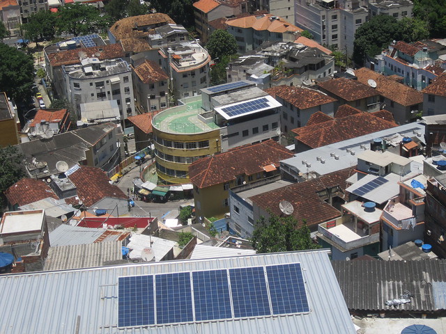 Schools, stores and associations generate their own electricity by means of solar panels on their rooftops in Morro de Santa Marta, a favela or shantytown located in the traditional neighbourhood of Botafogo, in Rio de Janeiro. CREDIT: Mario Osava/IPS