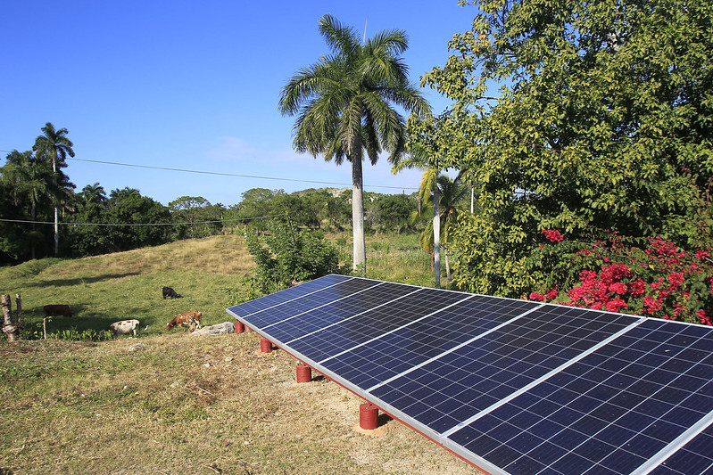 A row of solar panels on La Finca Vista Hermosa farm in Guanabacoa, one of Havana's 15 municipalities, represents one of the small energy innovations that are part of the responses by some farms in Cuba aimed at making their production more sustainable. CREDIT: Jorge Luis Baños/IPS