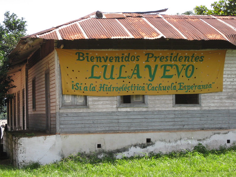 Hydroelectricity is no longer the overwhelmingly predominant source of energy in Brazil, as sources such as wind and solar gain ground. All that remains of some mega-projects are old signs, like this one in Cachuela Esperanza, a Bolivian town where former presidents Evo Morales of Bolivia and Luiz Inácio Lula da Silva of Brazil announced the construction of a large binational hydroelectric plant on the Beni River, which never materialised. CREDIT: Mario Osava/IPS
