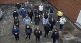 A group of Farmacoop workers stand in the courtyard of their plant in Buenos Aires. Members of the Argentine cooperative proudly say that theirs is the first laboratory in the world to be recovered by its workers. CREDIT: Courtesy of Pedro Pérez/Tiempo Argentino.