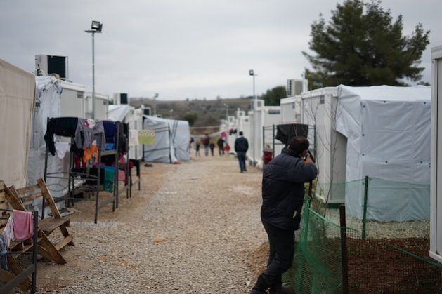 Refugee tents in a camp in Greece. UN report shows refugees may be affected by poor health outcomes. CREDIT: Julie Ricard/Unsplash)