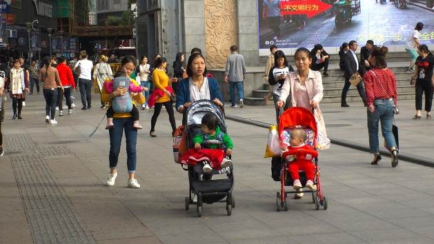 With China’s population at 1.4126 billion, the reported decrease of 850,000 amounts to 0.06 percent. Credit: Shutterstock.
