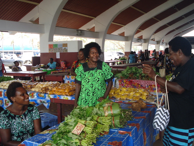 Regular market vendor, Susan, lost much of her garden produce during the two cyclone disasters and is selling dry packaged food, such as banana chips, instead. Central Market, Port Vila, Vanuatu. Photo credit: Catherine Wilson/IPS