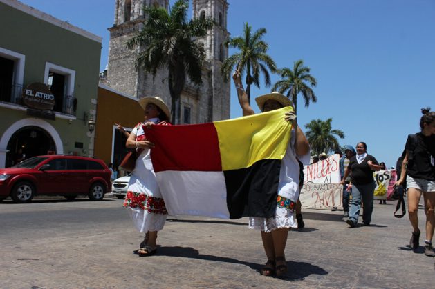 Carrying the Mayan flag, members of the Colibrí Collective lead a march against the Mayan Train in the city of Valladolid, in the southern Mexican state of Yucatán, in May 2023. The construction of the Mexican government’s most important megaproject has drawn criticism from affected communities due to its environmental, social and cultural effects. CREDIT: Arturo Contreras / Pie de Página - Mexico’s development banks have violated their own socio-environmental standards while granting loans for the construction of the Mayan Train (TM), the flagship project of the presidency of Andrés Manuel López Obrador
