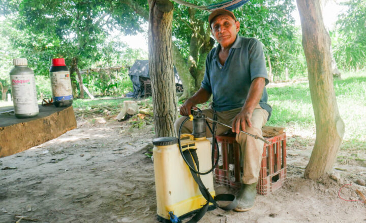 Juan Mejía, a small farmer, takes a break from his daily chores on his two-hectare plot in the El Carrizal canton, in the municipality of Santa María Ostuma, El Salvador. Mejía still continues to use herbicides such as paraquat, but has reduced their use by 90 percent, and is now shifting to agroecological production. CREDIT: Edgardo Ayala
