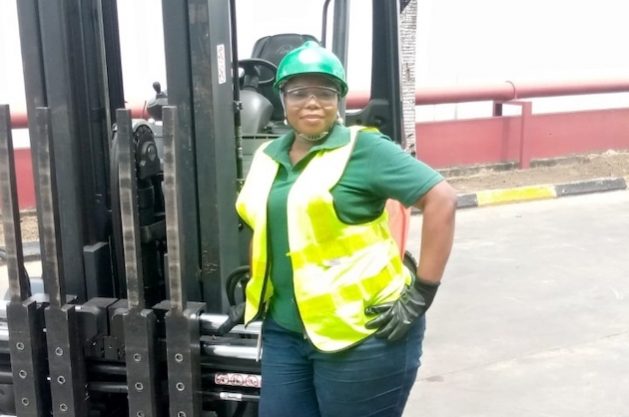 Bukes Saliu, a forklift driver, is a Nigerian woman who challenging stereotypes. Credit: Promise Eze/IPS