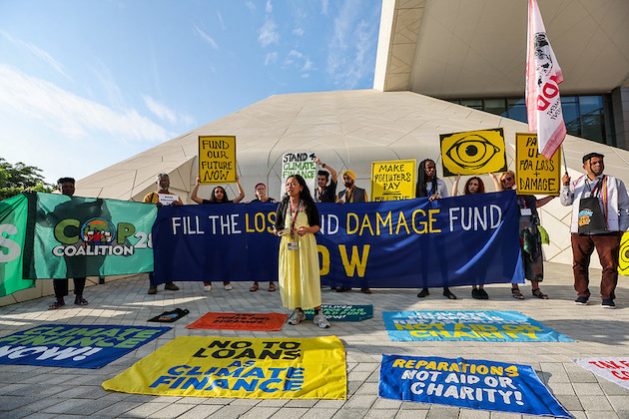 Activists Digo Bikas Institute at COP28 demand reparations rather than loans for loss and damage. Experts believe while the agreements on Loss and Damage Fund on the first day of the conference there is a long road ahead. Credit: COP28/Mahmoud Khaled