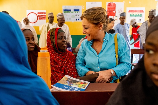 Yasmine Sherif, Education Cannot Wait Executive Director, speaks with students at the ECW-supported Pompomary Primary School in Maiduguri, North-East Nigeria. Credit: ECW