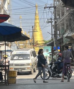 A Buddhist pagoda towers above a teeming thoroughfare in Mae Sot, [...] <a class=