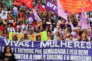 Women march for their rights on Mar. 8, 2023, in Brasília. Every International Women's Day, Brazilian women take to the streets in towns and cities to protest against sexism, racism and other factors of gender inequality. CREDIT: Lula Marques / Agência Brasil