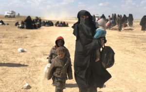 Families as they tried to escape from Baghouz, the last Syrian town under the control of the Islamic State to fall. The IS leaders escaped, leaving behind almost 25,000 of their followers. Credit: Jewan Abdi/ IPS