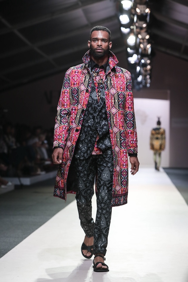 A model wearing a suite from the Presidential collection created by Theresa Giannuzzi as part of SA Fashion Week. Nelson Mandela, a former president of South Africa, served as the inspiration for the collection.