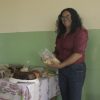 Leide Aparecida Souza, president of the Association of Residents of the Genipapo Settlement in the rural area of Acreúna, a municipality in central-western Brazil, stands next to breads and pastries from the bakery where 14 rural women work. The women's empowerment and self-esteem have been boosted by the fact that they earn their own income, which is more stable than from farming, and provide an important service to their community. CREDIT: Marina Carolina / IPS