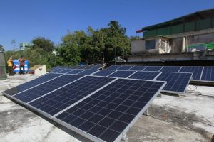 Solar panels line the rooftop of the home of Cuban entrepreneur Felix Morffi, in the...<a href=