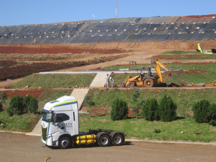 The photo shows a truck running 100 percent on biomethane and, in the background, the industrial waste landfill in Chapecó, in southwestern Brazil. The company Cetric acquired another 28 trucks that will use fuel from its own production. CREDIT: Mario Osava / IPS