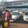 Migrants use a cross-border bus in Bulawayo to enter South Africa. Credit: Ignatius Banda/IPS