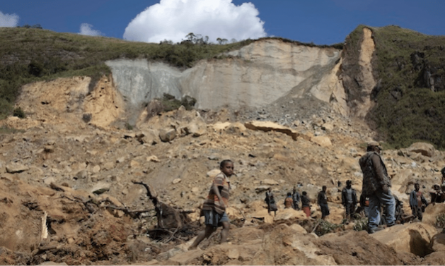 The local community from Yambani in Papua New Guinea assess the damage of the May 26, 2024, landslide. Credit: UNICEF