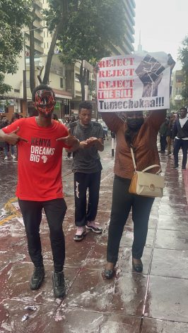 Youth demonstrate on the streets of Nairobi, adjacent to the national parliament, while legislators rush to pass the Finance Bill 2024. Credit: Robert Kibet/IPS