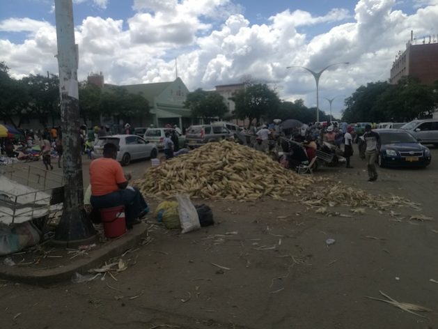 Vendors in Bulawayo's central business district, where overcrowding is the new normal. Credit: Ignatius Banda/IPS