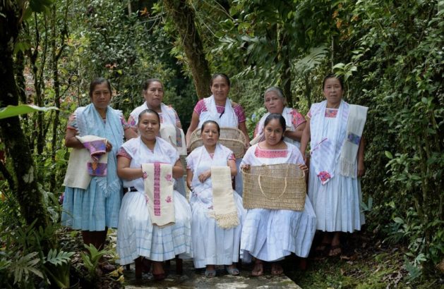 Members of the Masehual Siumaje Mosenyolchicauani women's cooperative, who teach weaving and other crafts of the Nahua people, in Cuetzalan del Progreso, central Mexico. Credit: Courtesy of Taselotzin
