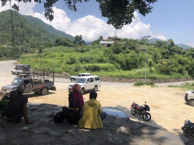 Locals in Shindhuli, Nepal, are resting under the tree to avoidexcessive heat. Hot days and heat wavesare becoming more frequent in recent years, and research says excessive heat impacts mental health. Credit: Tanka Dhakal/IPS