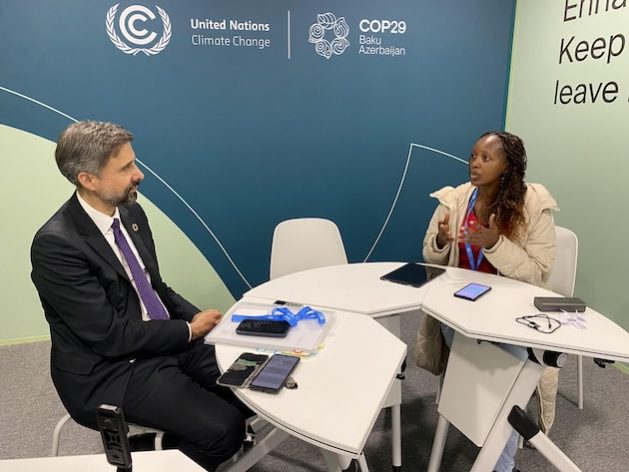 IPS' senior journalist Joyce Chimbi in conversation with IFAD President Dr. Alvaro Lario. Credit: IPS