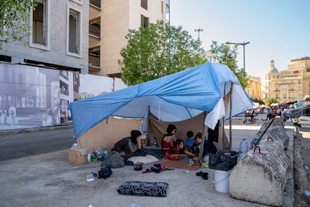 Samira, a mother of five, was forced to leave her home following bombardment and is now living with her children in the streets of Martyrs Square in Beirut. Credit: UNICEF/Fouad Choufany