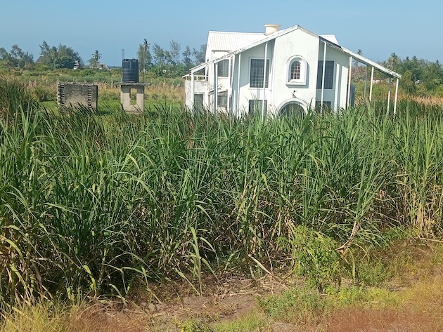 A modern home near Ununio Beach in Dar es Salaam is encircled by water. Credit: Kizito Makoye/IPS