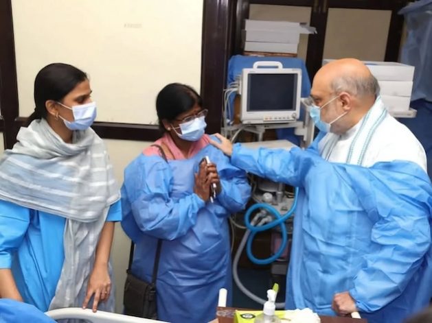 India's Home Minister Amit Shah interacting with the families of those injured in the terror attack. Credit: Supplied