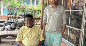 Deportee from the U.S., Aasis Subedi, with his father, Narayan Kumar Subedi. Credit: Diwash Gahatraj/IPS