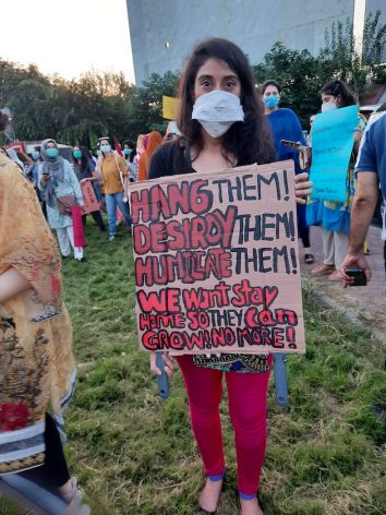 Noor Mukadam at a protest outside the Islamabad Press Club, holding a poster demanding justice for a rape survivor. The photo was taken on September 12, 2020. She was murdered by her partner on 20 July 2021. Credit: Shafaq Zaidi